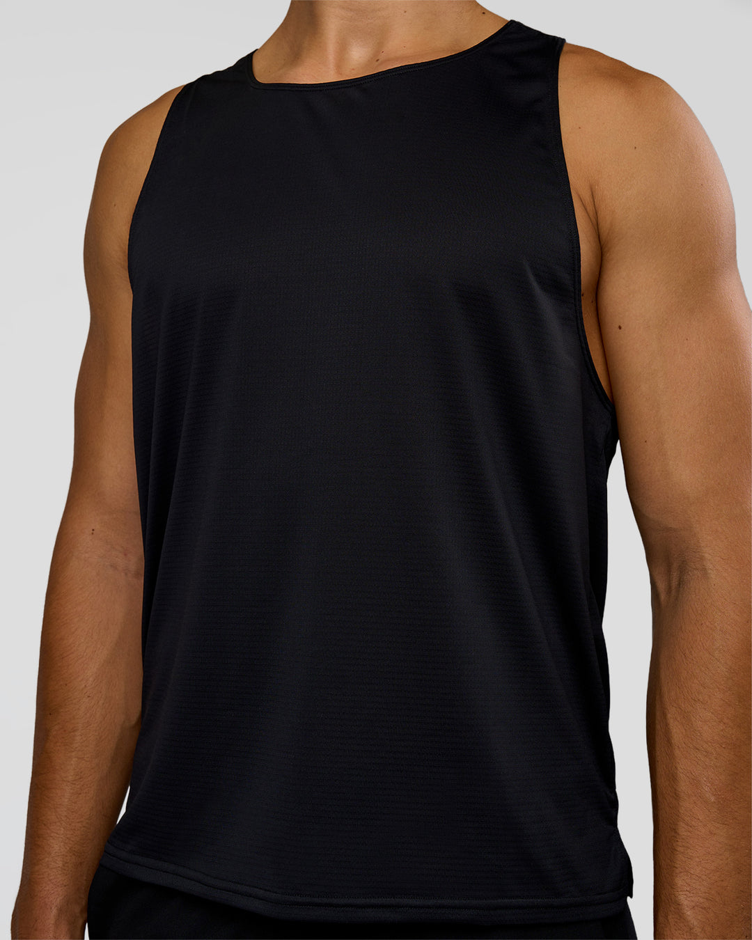 Man wearing Pace Running Tank 3.0  - Black | Model:Jackson | Size:L