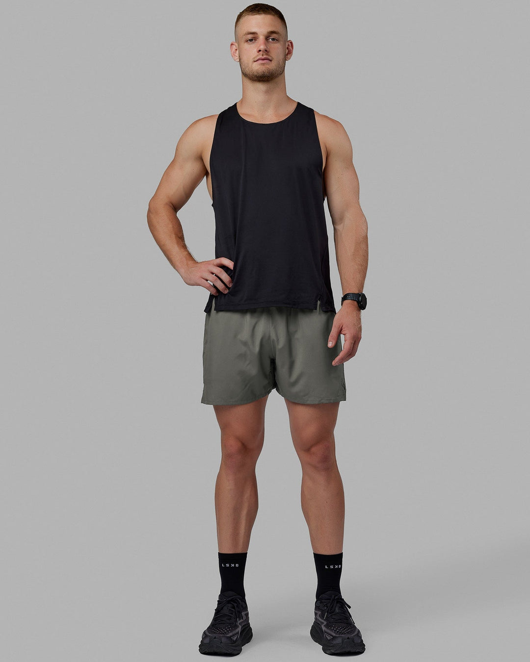 Man wearing Pace Running Tank - Black