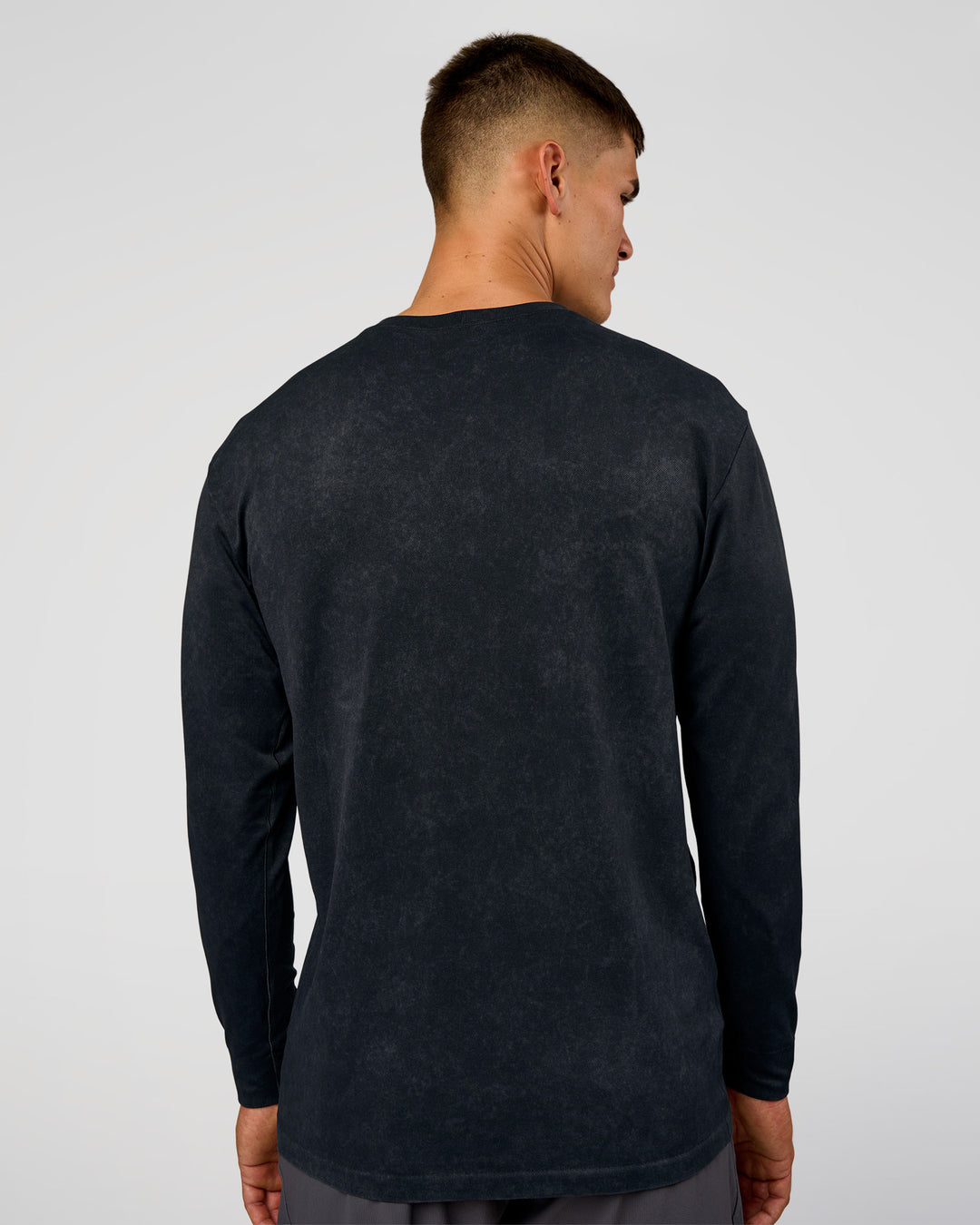 Man wearing Power Oversized Long Sleeve Tee - Black Washed | Model:Jackson | Size:L