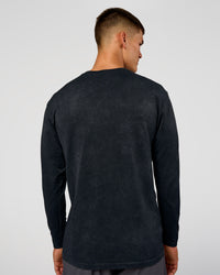 Man wearing Power Oversized Long Sleeve Tee - Black Washed | Model:Jackson | Size:L