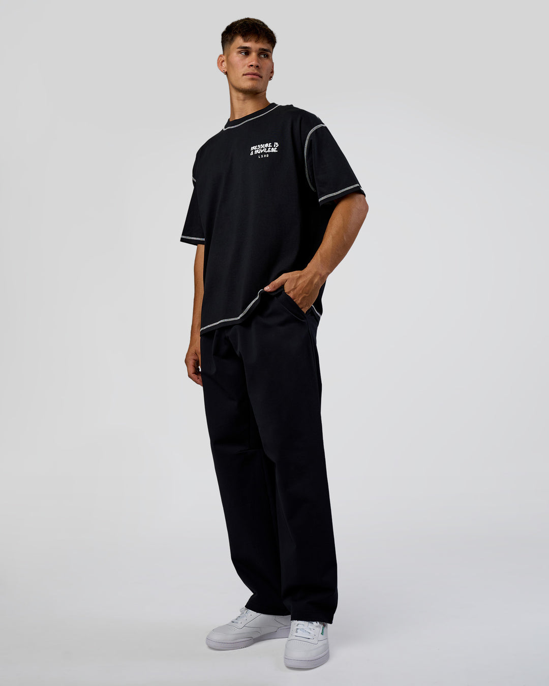 Man wearing Pressure is Privilege Oversized Tee - Black-White | Model:Jackson | Size:L