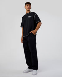 Man wearing Pressure is Privilege Oversized Tee - Black-White | Model:Jackson | Size:L