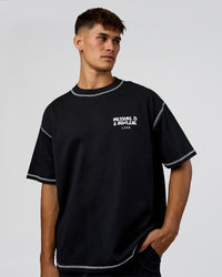 Man wearing Pressure is Privilege Oversized Tee - Black-White | Model:Jackson | Size:L