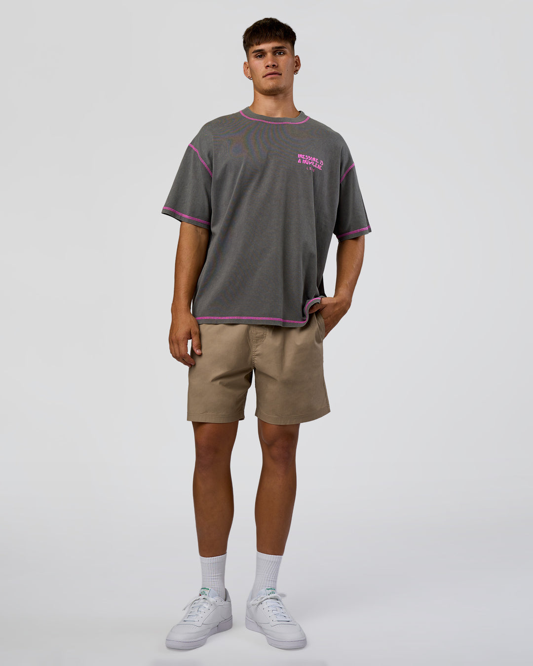 Man wearing Pressure is Privilege Oversized Tee - Dark Storm Washed-Ultra Fuchsia | Model:Jackson | Size:L