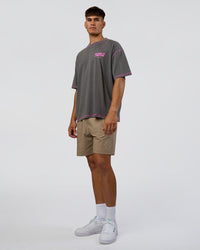 Man wearing Pressure is Privilege Oversized Tee - Dark Storm Washed-Ultra Fuchsia | Model:Jackson | Size:L