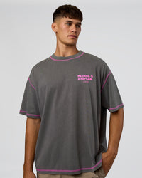 Man wearing Pressure is Privilege Oversized Tee - Dark Storm Washed-Ultra Fuchsia | Model:Jackson | Size:L