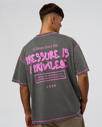 Man wearing Pressure is Privilege Oversized Tee - Dark Storm Washed-Ultra Fuchsia | Model:Jackson | Size:L