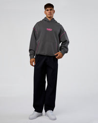 Man wearing Pressure is Privilege Oversized Hoodie - Dark Storm-Ultra Fuchsia | Model:Jackson | Size:L
