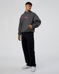 Man wearing Pressure is Privilege Oversized Hoodie - Dark Storm-Ultra Fuchsia | Model:Jackson | Size:L