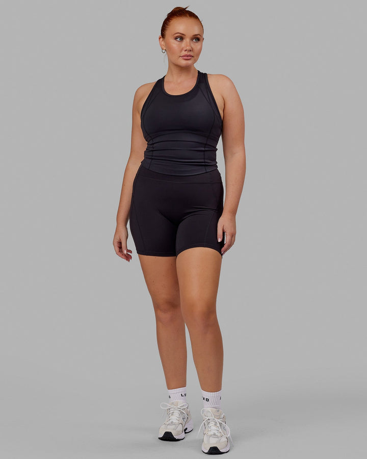  Woman wearing Propel Performance Tank - Black