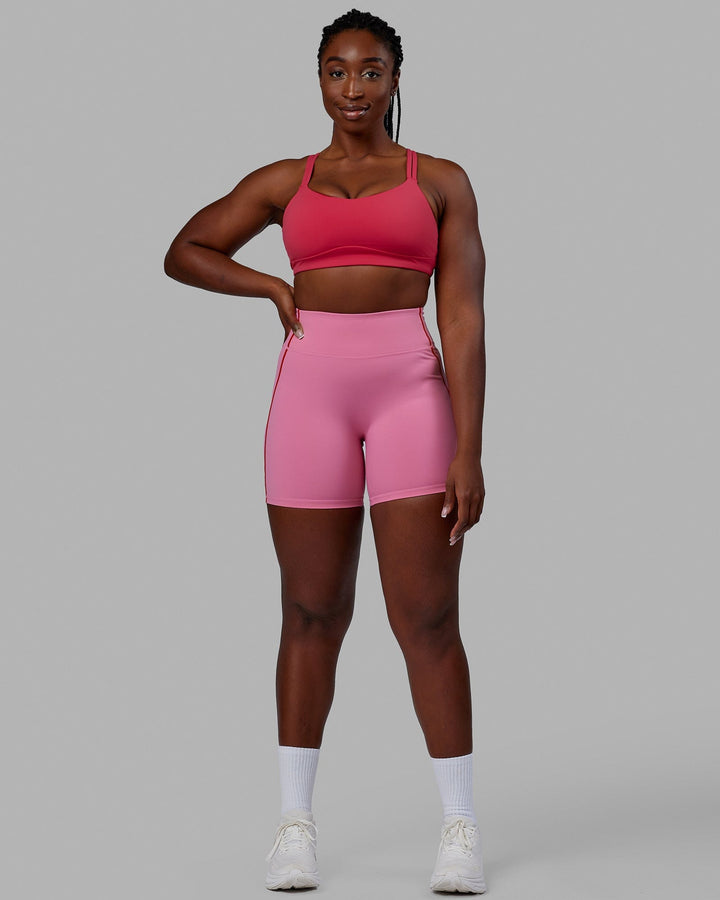 Woman wearing Pulse Mid Short Tights - Pink Rose-Scarlet