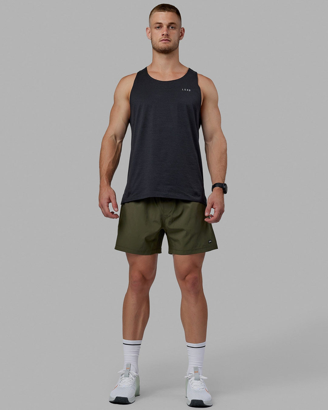 Man wearing Rep 5" Lined Performance Short - Forest Night
