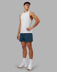 Man wearing Rep 5" Performance Short - Indigo | Model:Jackson | Size:L