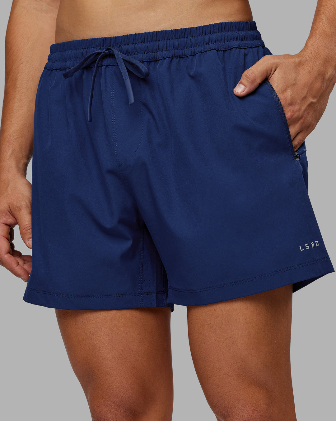 Man wearing Rep 5&quot; Performance Short - Midnight Blue | Model:Jackson | Size:L
