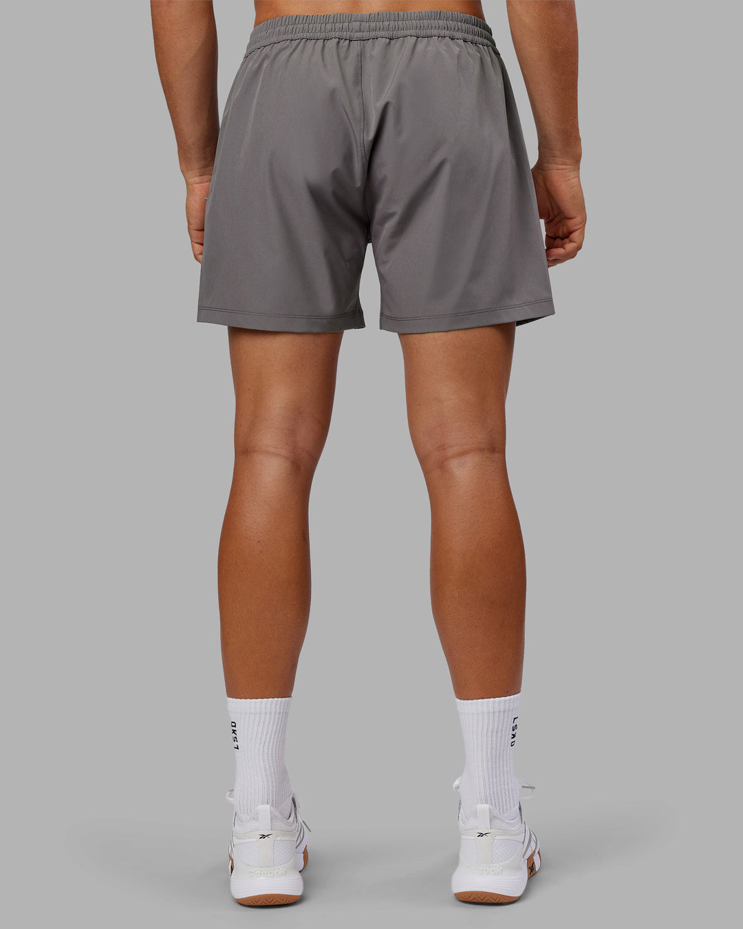 Man wearing Rep 5" Performance Short - Storm Front | Model:Jackson | Size:L