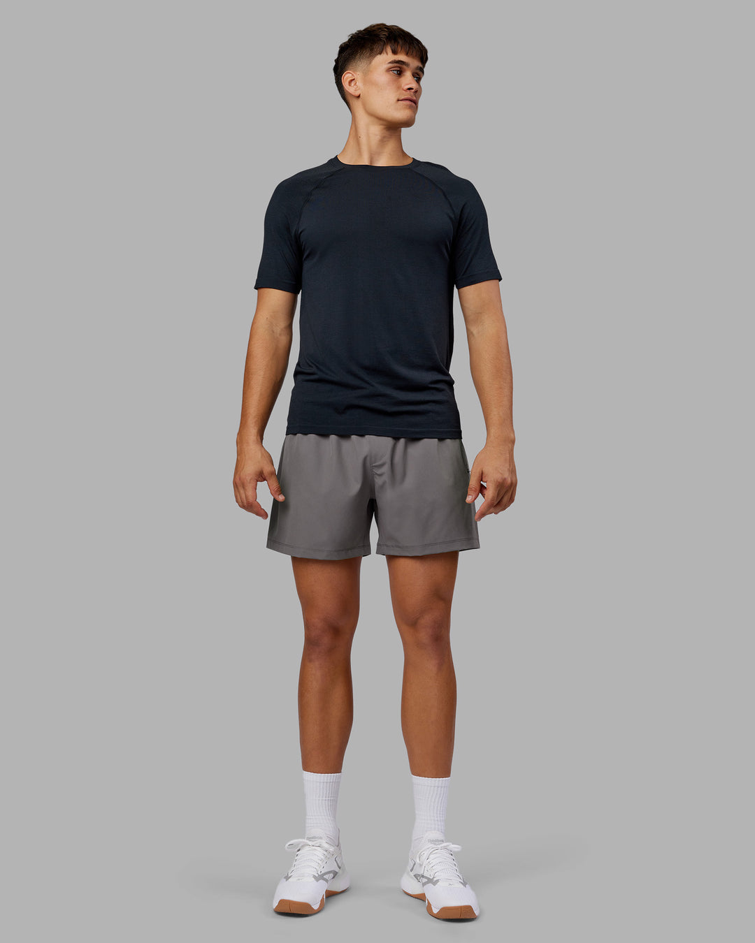 Man wearing Rep 5" Performance Short - Storm Front | Model:Jackson | Size:L