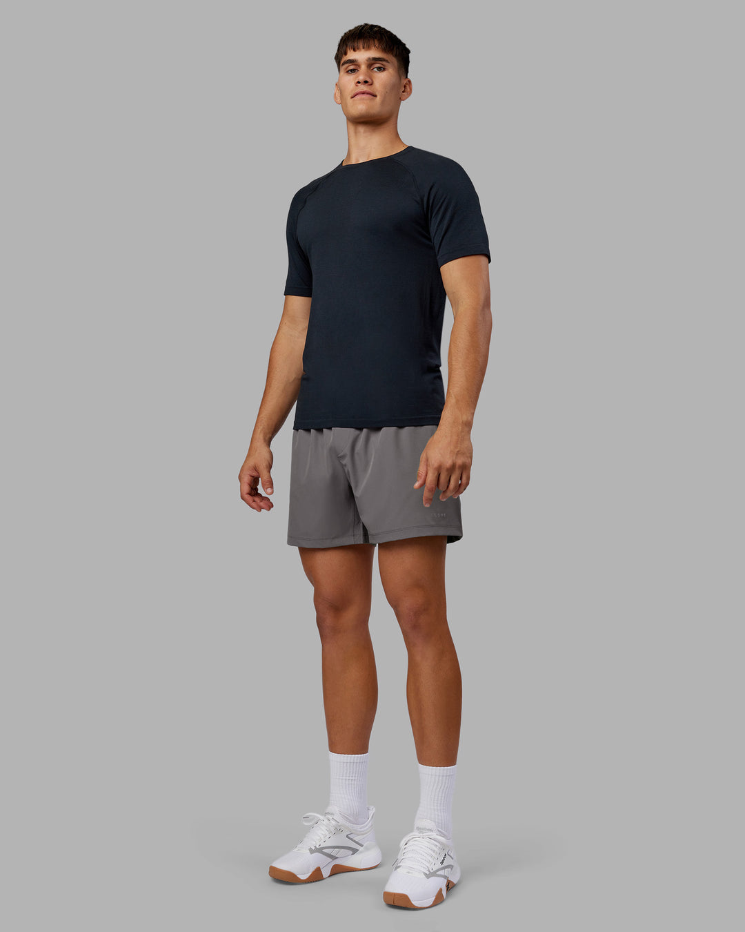 Man wearing Rep 5" Performance Short - Storm Front | Model:Jackson | Size:L