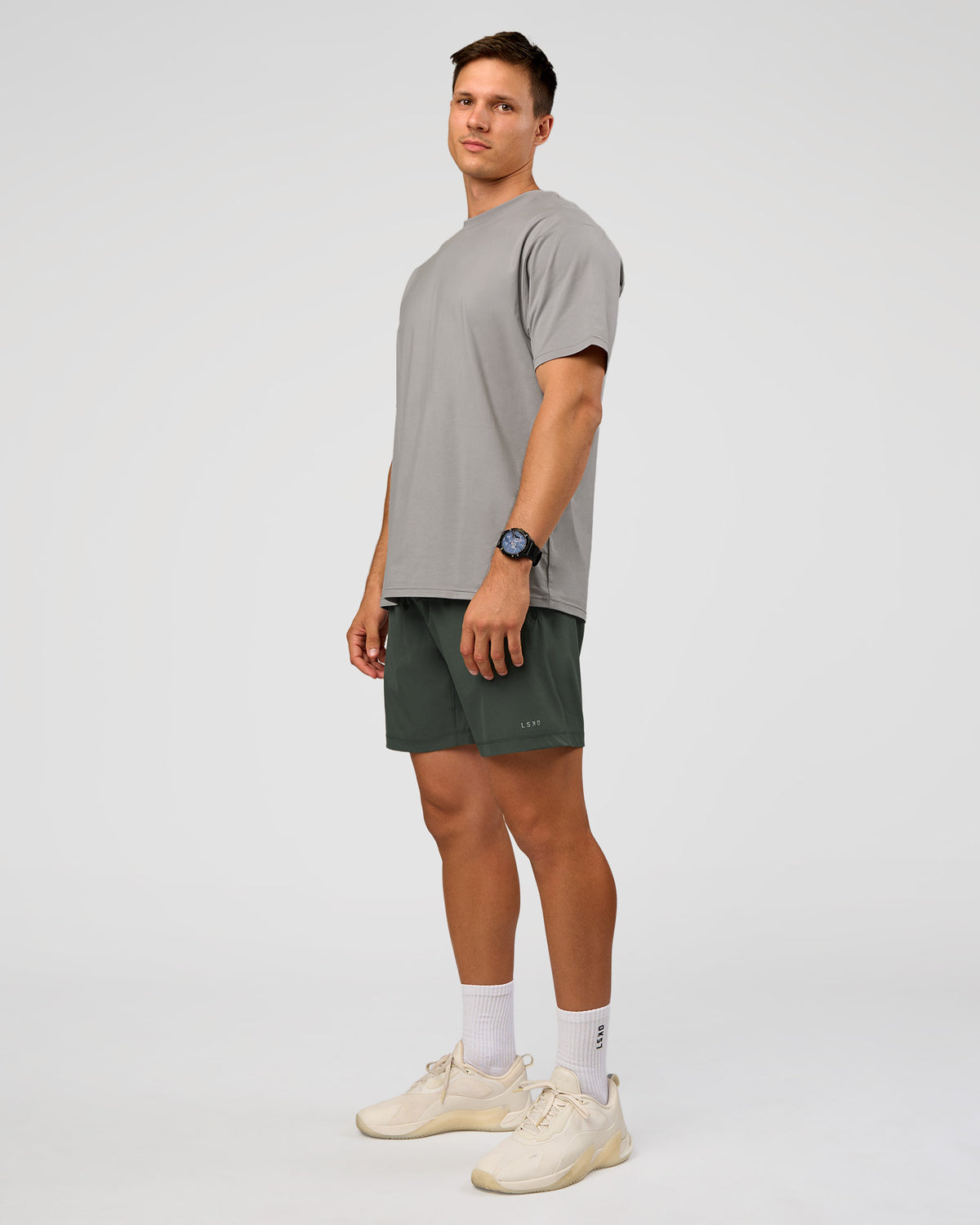 Man wearing Rep 7'' Performance Short - Carbon Green | Model:Liam | Size:L