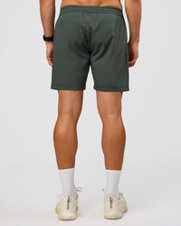Man wearing Rep 7'' Performance Short - Carbon Green | Model:Liam | Size:L
