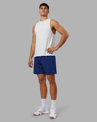Man wearing Rep 7'' Performance Short - Midnight Blue | Model:Jackson | Size:L