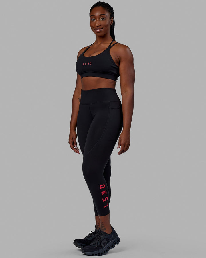 Woman wearing Rep 7/8 Length Tights - Black-Raspberry