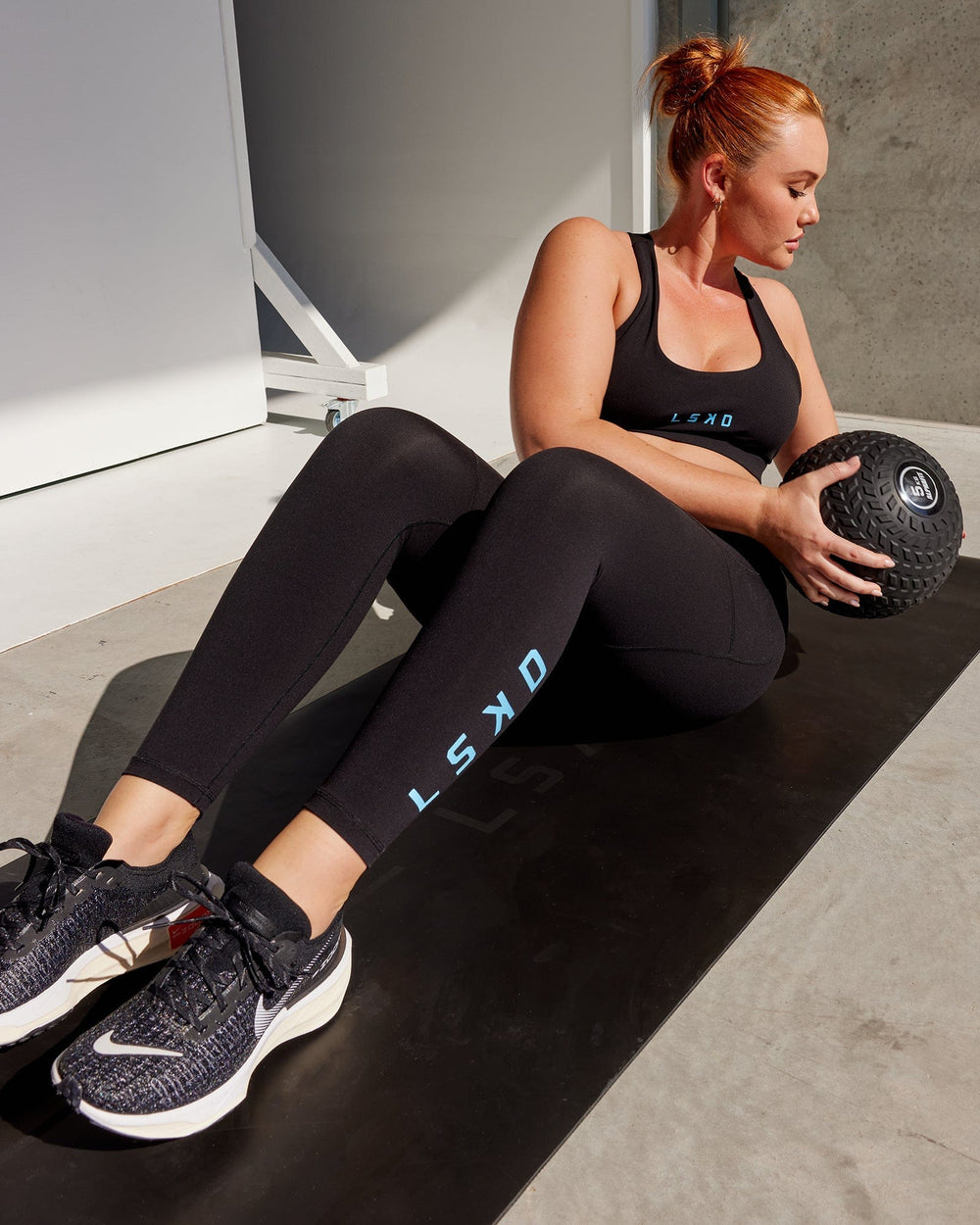 Woman wearing Rep Full Length Tight - Black-Azure Blue