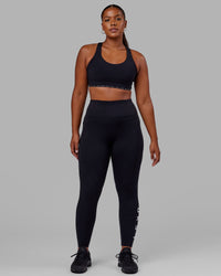Woman wearing Rep Ultra High-Rise Full Length Legging Pockets - Black-White | Model:Sierra | Size:L