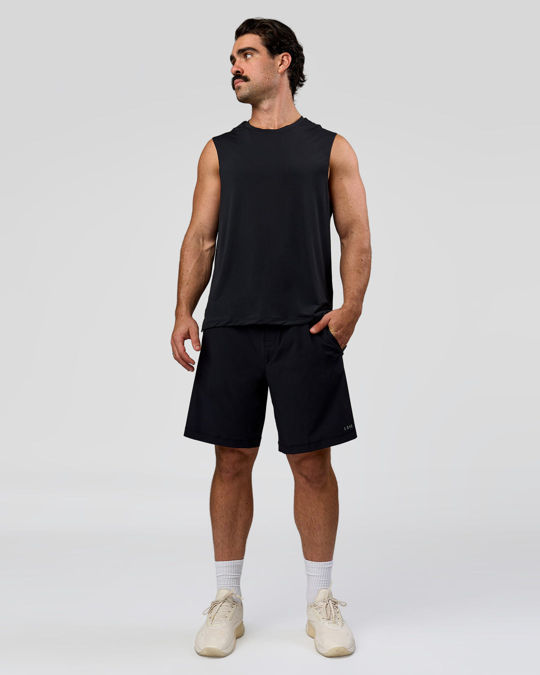 Man wearing Rep Muscle Training Tank - Black | Model:Adam | Size:L