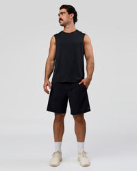 Man wearing Rep Muscle Training Tank - Black | Model:Adam | Size:L