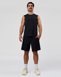 Man wearing Rep Muscle Training Tank - Black | Model:Adam | Size:L