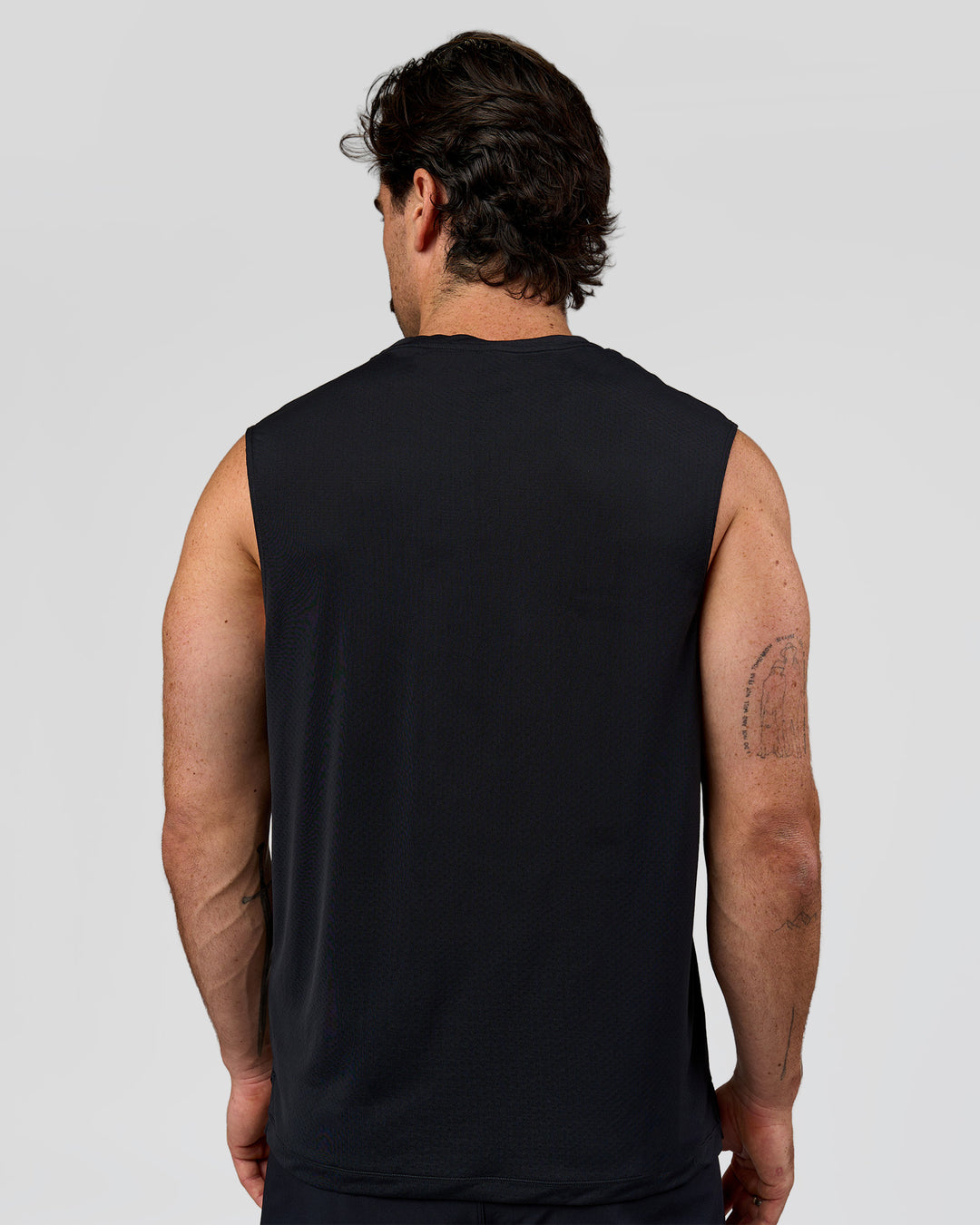 Man wearing Rep Muscle Training Tank - Black | Model:Adam | Size:L