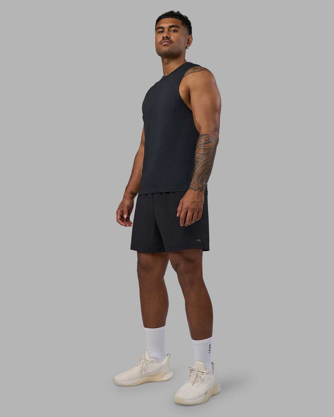Man wearing Rep TRD Ripstop 7&quot; Training Short - Black | Model:Xav | Size:L