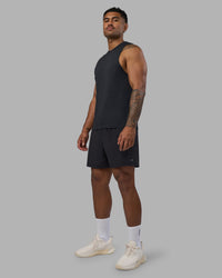 Man wearing Rep TRD Ripstop 7" Training Short - Black | Model:Xav | Size:L