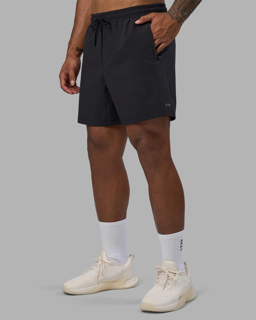 Man wearing Rep TRD Ripstop 7&quot; Training Short - Black | Model:Xav | Size:L