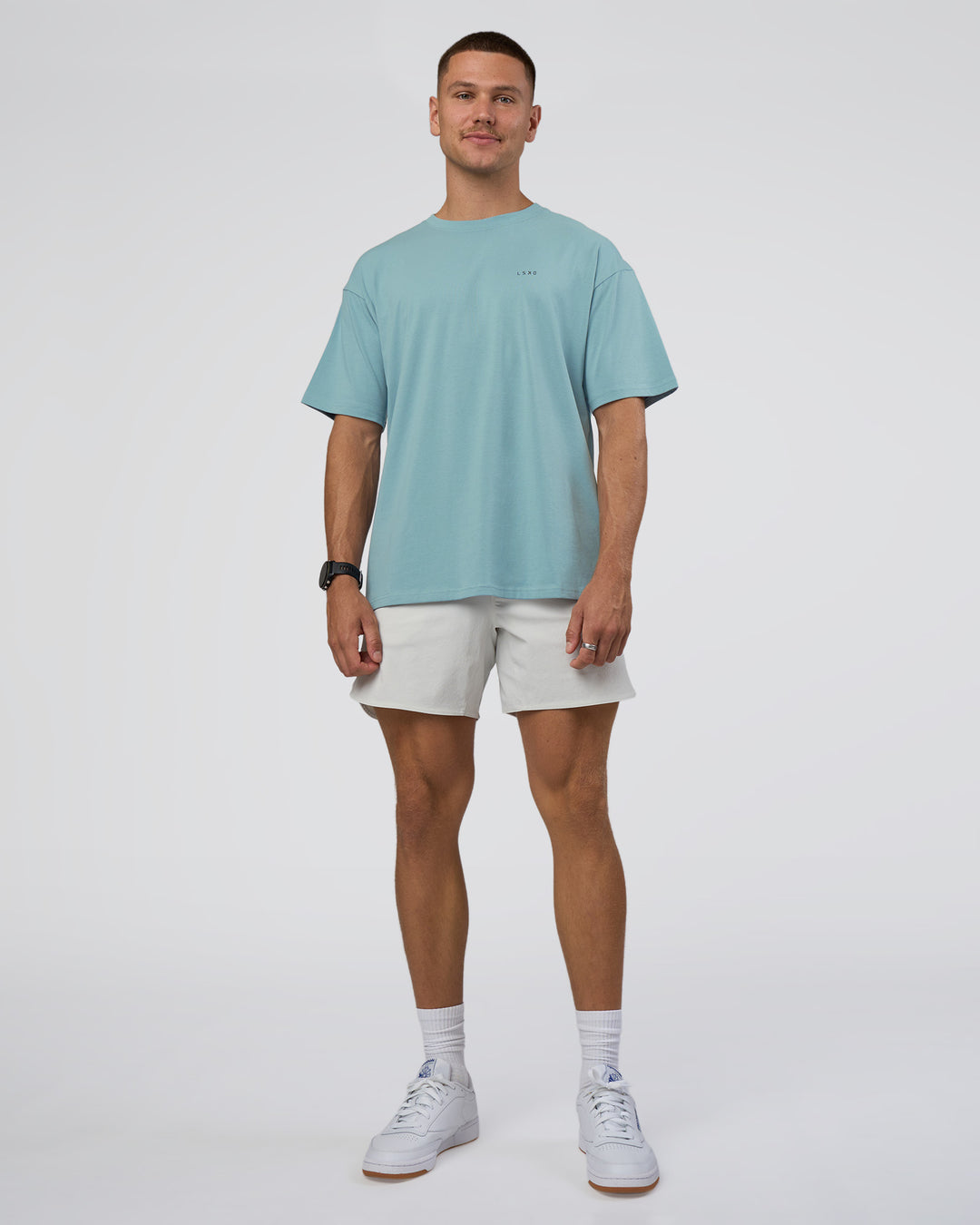 Man wearing Research Department FLXCotton Oversized Tee - Smoke Blue | Model:Nikola | Size:L