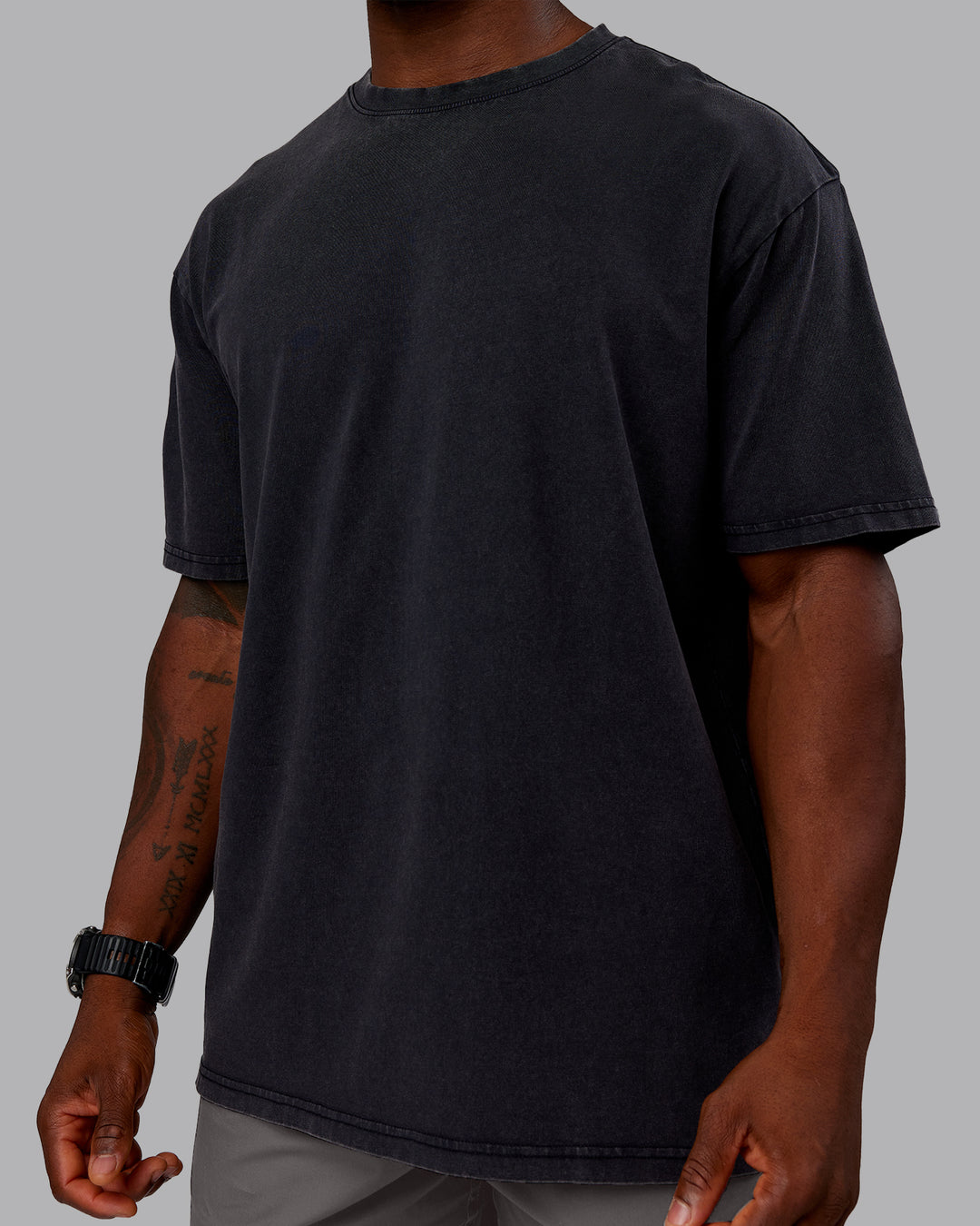 Man wearing Rise &amp; Lift Washed FLXCotton Oversized Tee - Black-Plum Berry | Model:Sam | Size:L
