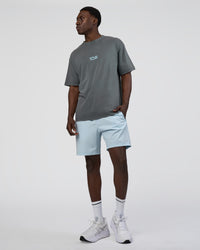 Man wearing Runner's FLXCotton Oversized Tee - Dark Storm Washed-Open Air | Model:Paabio | Size:L