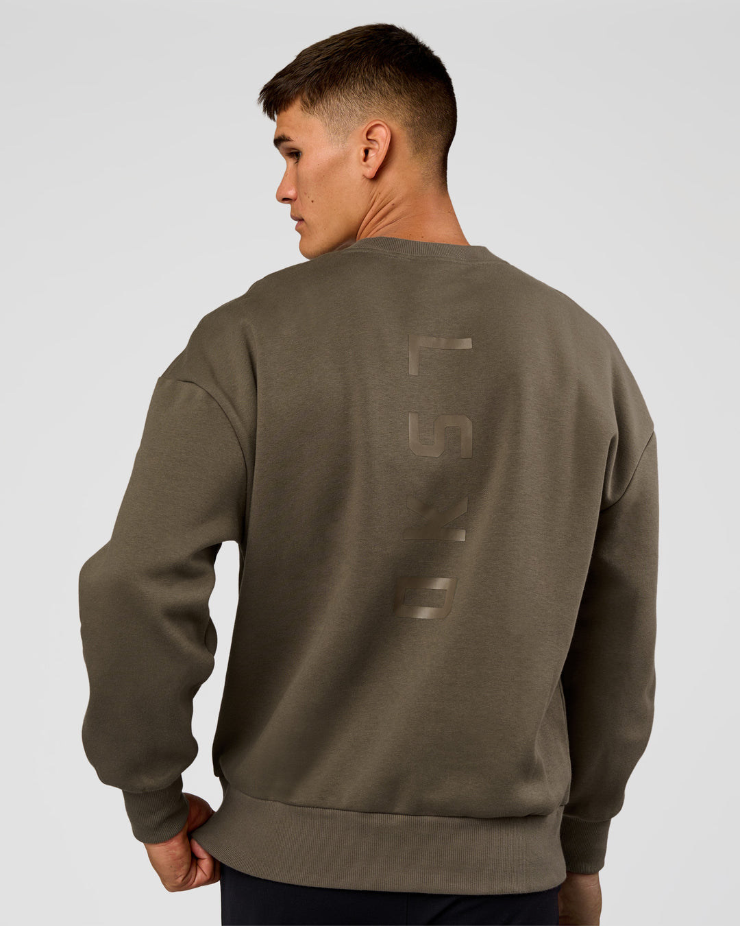 Man wearing Shadow Mode Oversized Sweater - Walnut Grey | Model:Jackson | Size:L
