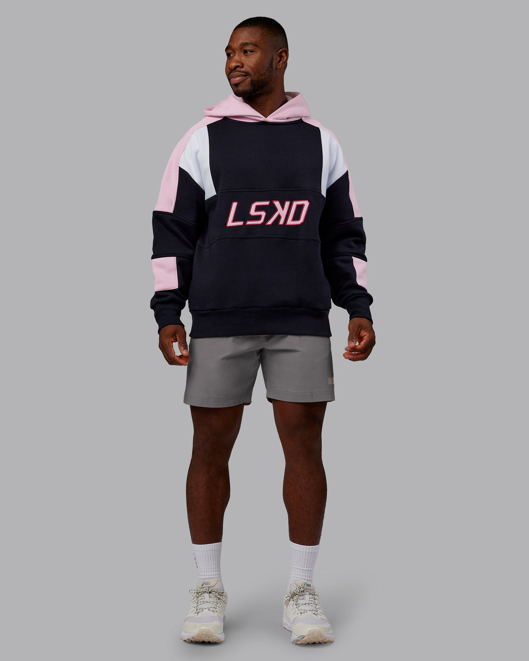 Man wearing Slam Oversized Hoodie - Caviar-Light Bubblegum | Model:Sam | Size:L