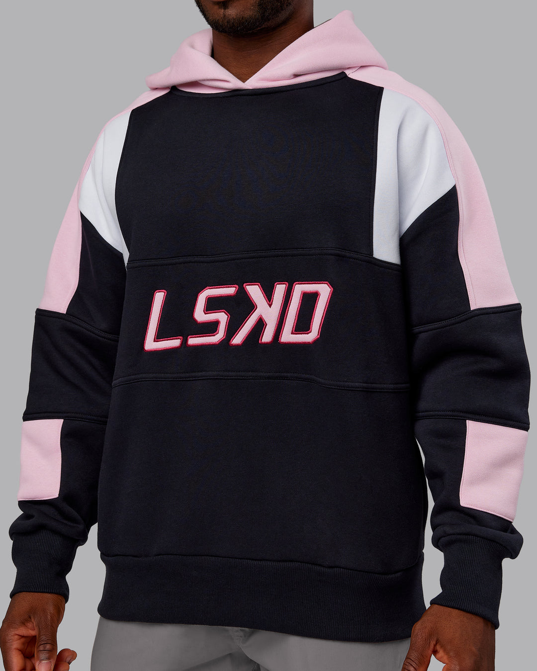 Man wearing Slam Oversized Hoodie - Caviar-Light Bubblegum | Model:Sam | Size:L