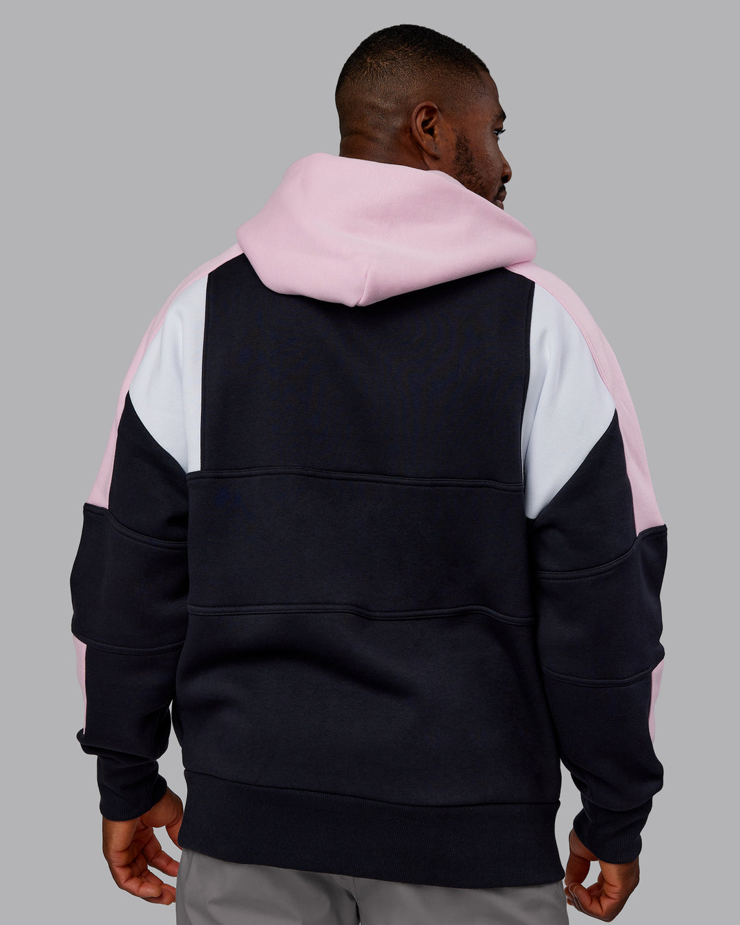 Man wearing Slam Oversized Hoodie - Caviar-Light Bubblegum | Model:Sam | Size:L