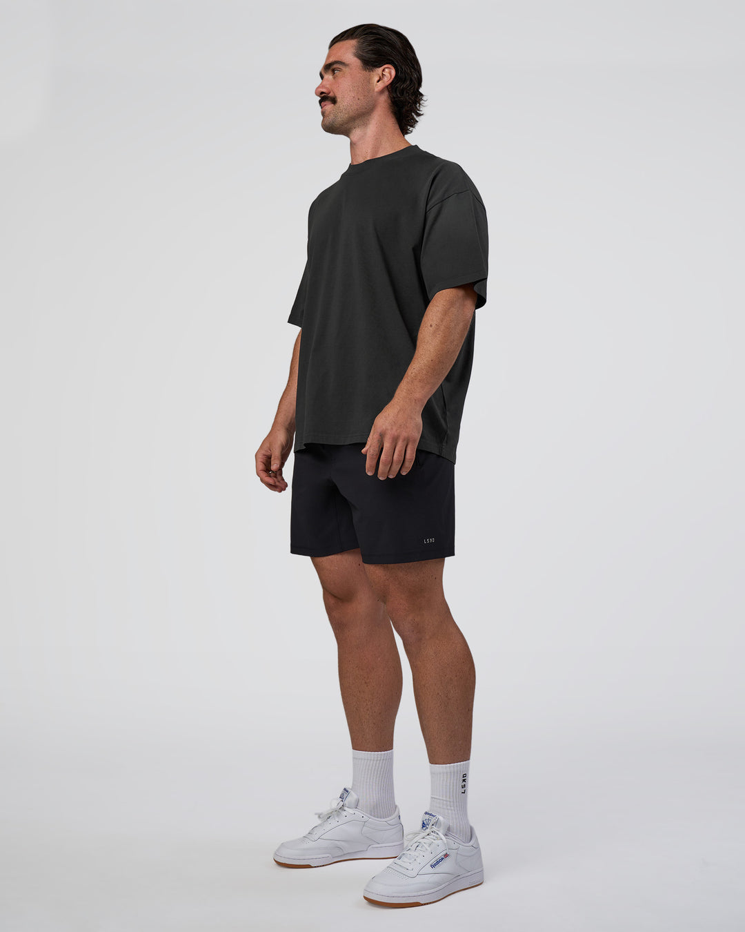 Man wearing Spray Heavyweight Unisex Oversized Tee - Charcoal Washed | Model:Adam | Size:L