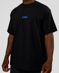 Man wearing Standard Issue FLXCotton Oversized Tee - Black-Palace Blue | Model:Sam | Size:L
