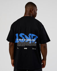 Man wearing Standard Issue FLXCotton Oversized Tee - Black-Palace Blue | Model:Sam | Size:L