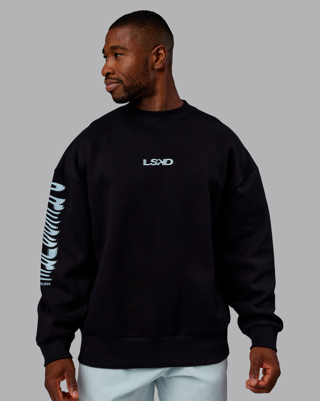 Man wearing Static Oversized Sweater - Black-Skyride | Model:Sam | Size:L