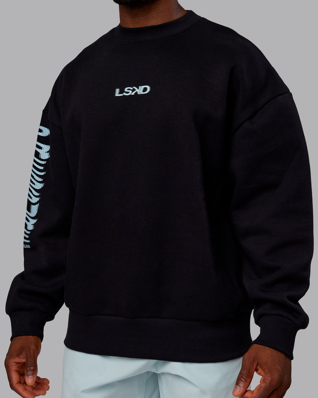 Man wearing Static Oversized Sweater - Black-Skyride | Model:Sam | Size:L