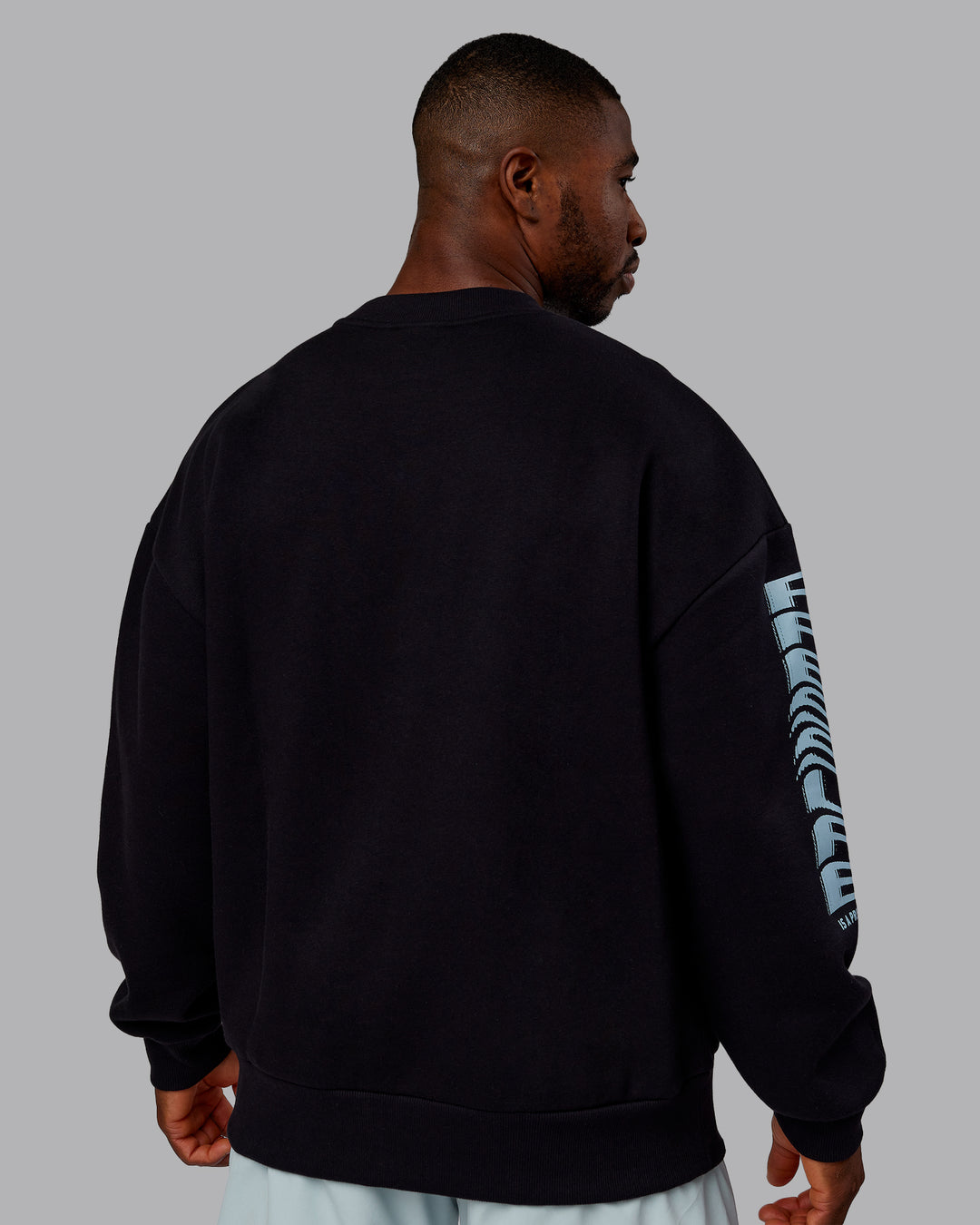 Man wearing Static Oversized Sweater - Black-Skyride | Model:Sam | Size:L