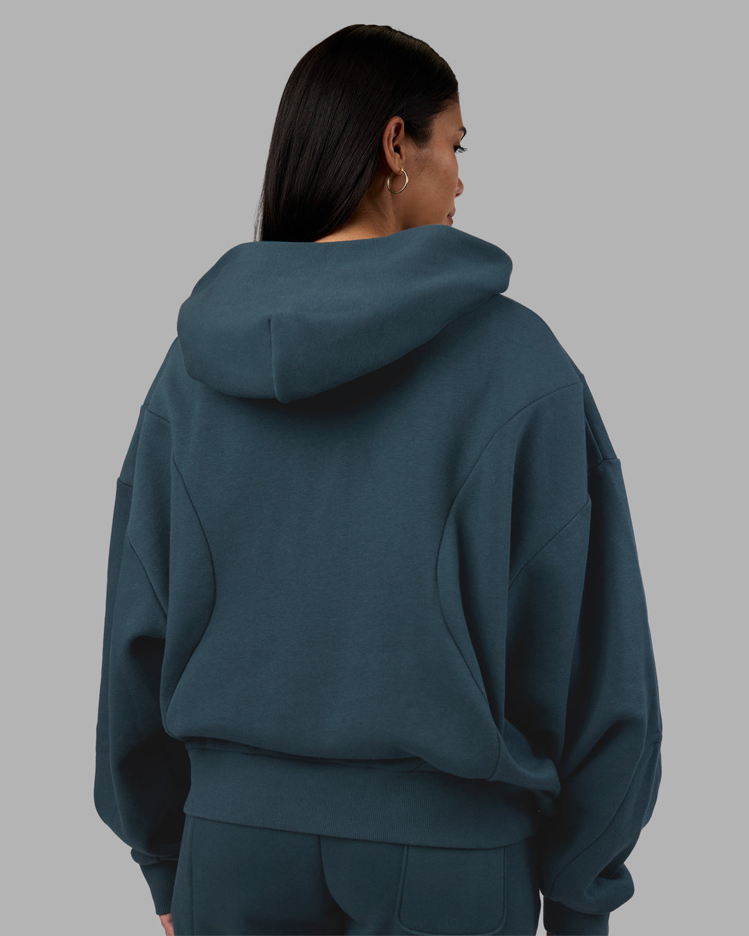 Woman wearing Stream Oversized Panel Zip Hoodie - Deep Sea | Model:Rhiley | Size:L