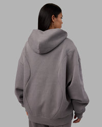 Woman wearing Stream Oversized Panel Zip Hoodie - Storm Front | Model:Rhiley | Size:L