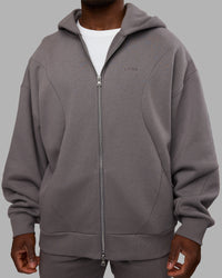 Man wearing Stream Oversized Panel Zip Hoodie - Storm Front | Model:Sam | Size:L